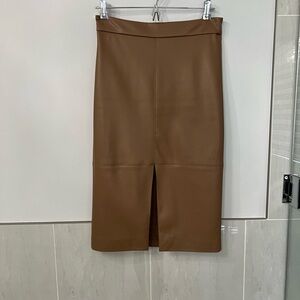 Leather like camel skirt. Size 2.